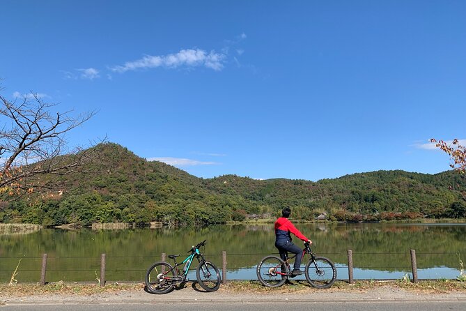 Arashiyama Kinkakuji Quiet Trail E-Bike Tour with Hotel Transfer - Hirosawa Pond: Calm Water and Heian-Era Sacred Space