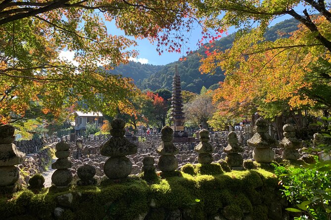 Arashiyama Kinkakuji Quiet Trail E-Bike Tour with Hotel Transfer - Adashino Nenbutsu-ji: The 1,000 Stone Statues Moment