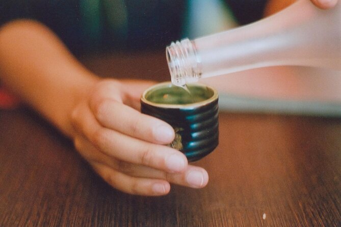 Fushimi Kyoto Walking Tour with Sake Tasting and Canal Boat Ride - Fushimi Yume Hyakushu Cafe: a nostalgic pause to land the experience