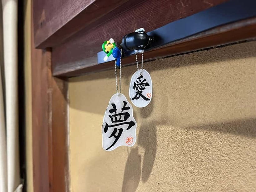 Kyoto: Calligraphy class at Buddhist temple in city center - Your omiyage: key-chain character gift plus a take-home artwork