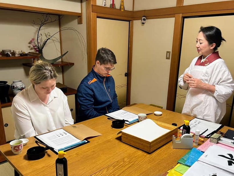 Kyoto: Local Home Visit and Japanese Calligraphy Class - Choosing your kanji, then adding your name in Japanese