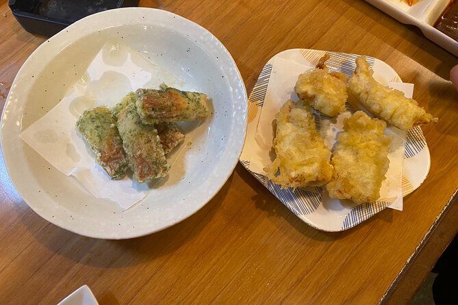Kyoto Night Food Tour Explore Kiyamachi's Culinary Delights - Stop 2 on Kiyamachi Street: Riverside Nights and Kyoto Drink Culture