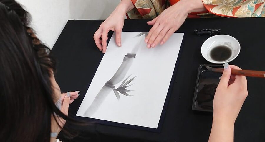 Kyoto: Sumi Ink and Brush Calligraphy Experience - Grinding sumi ink with an inkstone feels like the whole point