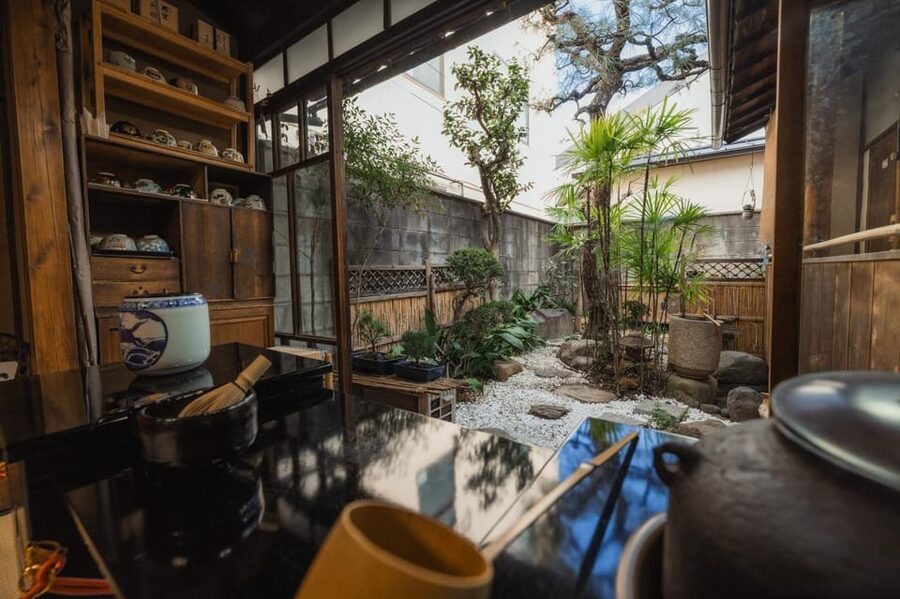 Kyoto: Table-Style Tea Ceremony at a Kyo-Machiya - Umbrellas, Folding Fans, and the Katana Prop for Photo Time